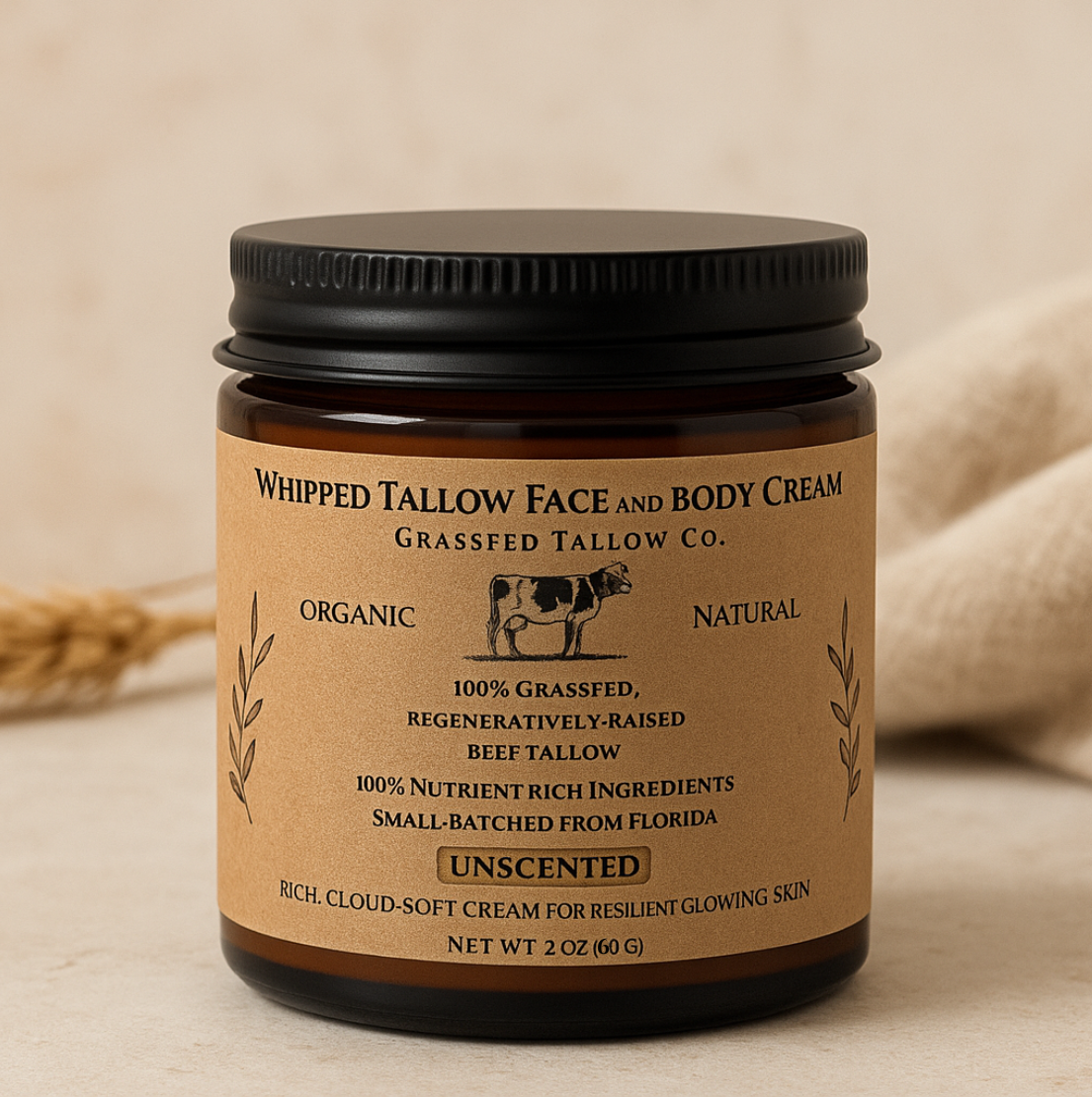Jar of Whipped Tallow Face and Body Cream with a brown label on a beige background